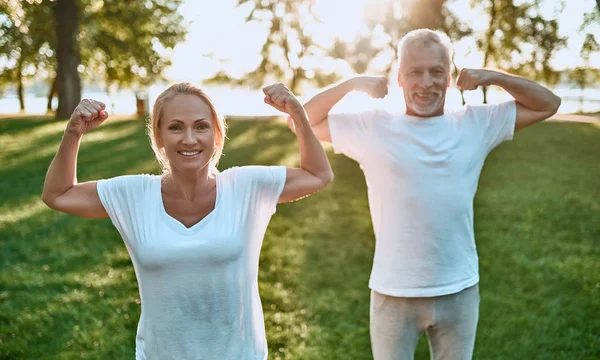 Senior Couple Doing Sport Outdoors Stretching Park Sunrise — Stock Photo, Image