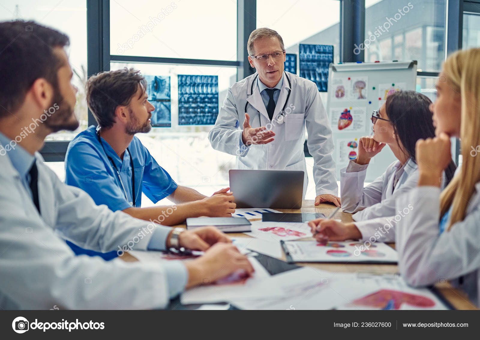 Group Doctors Working Together Clinic Medical Personnel Uniform Stock Photo by ©4pmphoto@gmail.com 236027600