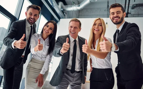 Business people working together in office. Group of office workers.