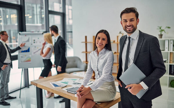 Business people working together in office. Group of office workers.