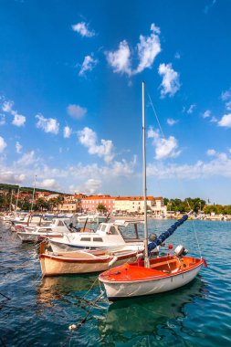 Boats in the Supetar harbor on the Brac island  at a summer, Croatia, Europe. clipart