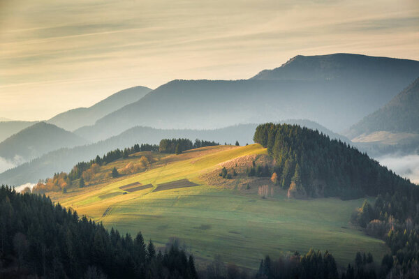 Landscape with mountains at sunrise. Mala Fatra National Park, not far from the village of Terchova in Slovakia, Europe.
