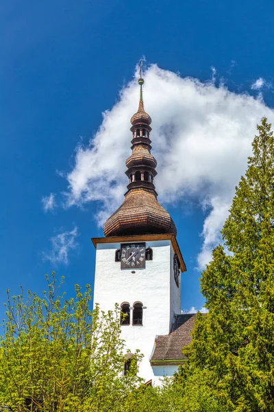 Church tower in The Spania Dolina village, Slovakia, Europe.