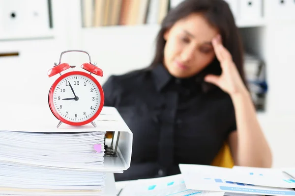 Tired and exhausted woman have a lot of work with documents fall asleep