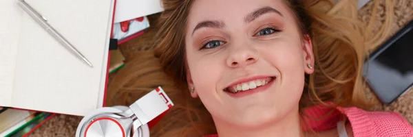 Young beautiful woman lie on floor have a lot of work is tired — Stock Photo, Image