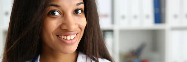 Beautiful black smiling female doctor portrait