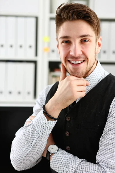 Handsome man in suit and tie stand in office Royalty Free Stock Images