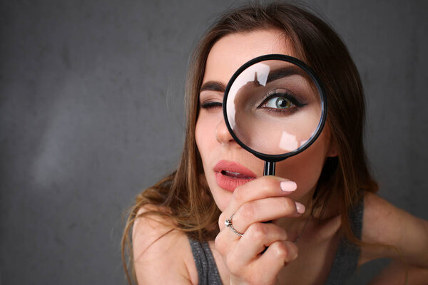 Young beautiful woman portrait looks painful