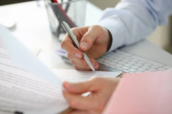 Hand of businessman in suit filling and — Stock Photo, Image