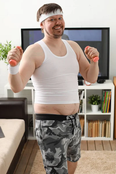 Young attractive man engaged in fitness — Stock Photo, Image