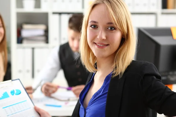 Beautiful smiling cheerful girl at workplace — Stock Photo, Image