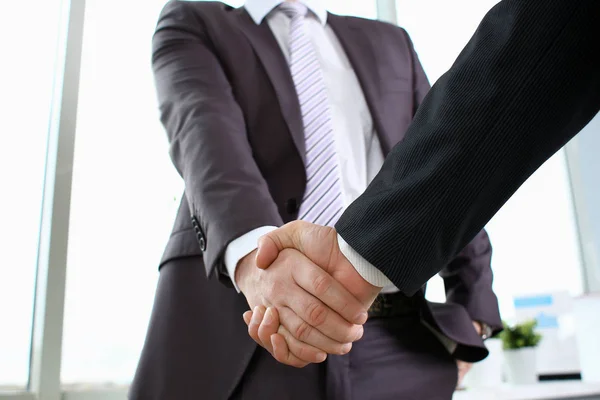 Man in suit shake hand as hello in office — Stock Photo, Image