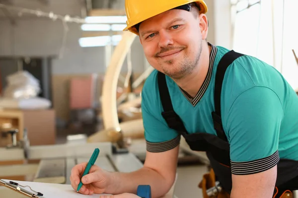 Portrait of young attractive man in work