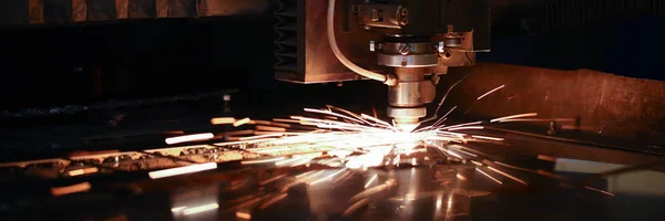Sparks fly out machine head for metal processing — Stock Photo, Image