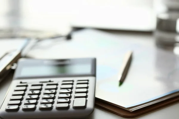 Silver calculator with gray keyboard is lying Stock Photo