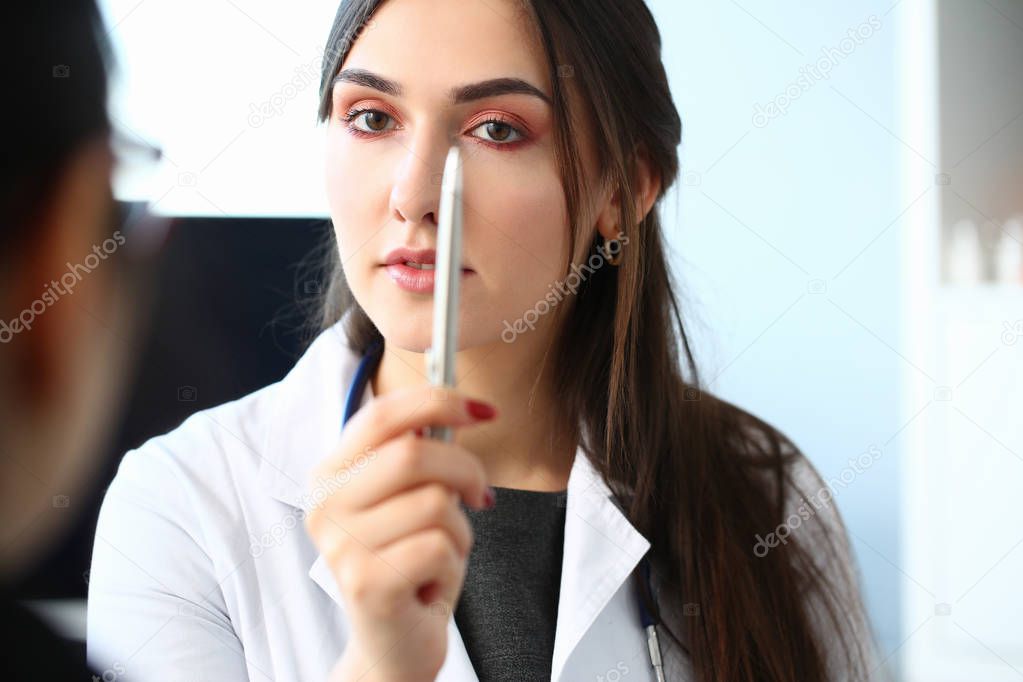 Female doctor expert narcology holding silver