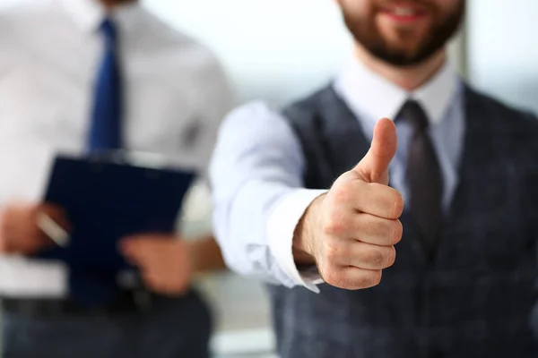 Male arm show OK or confirm during conference in office — Stock Photo, Image