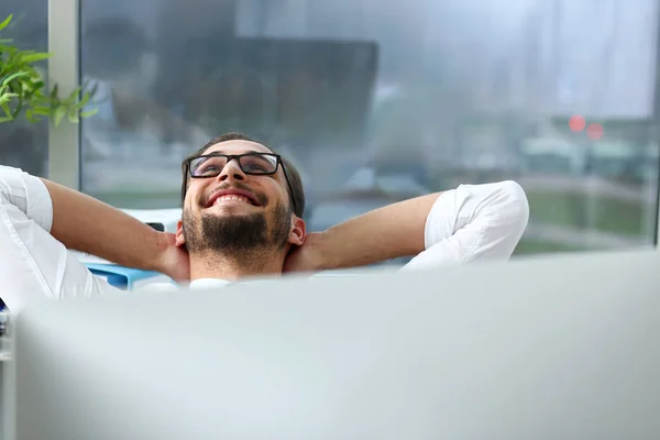 Handsome smiling bearded adult clerk person arms crossed