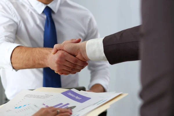 stock image Man in suit and tie give hand as hello in office