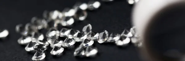 Scattering of white star diamonds on black — Stock Photo, Image