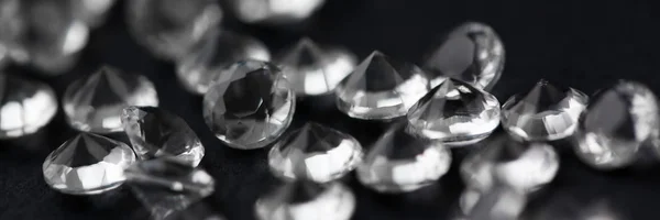 Scattering of white star diamonds on black — Stock Photo, Image