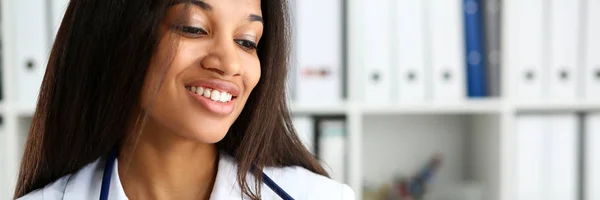 Beautiful black smiling female doctor portrait