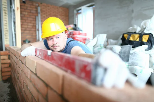 Prudent male in hardhat — Stock Photo, Image