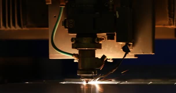 Sparks fly out machine head for metal processing — Stock Video