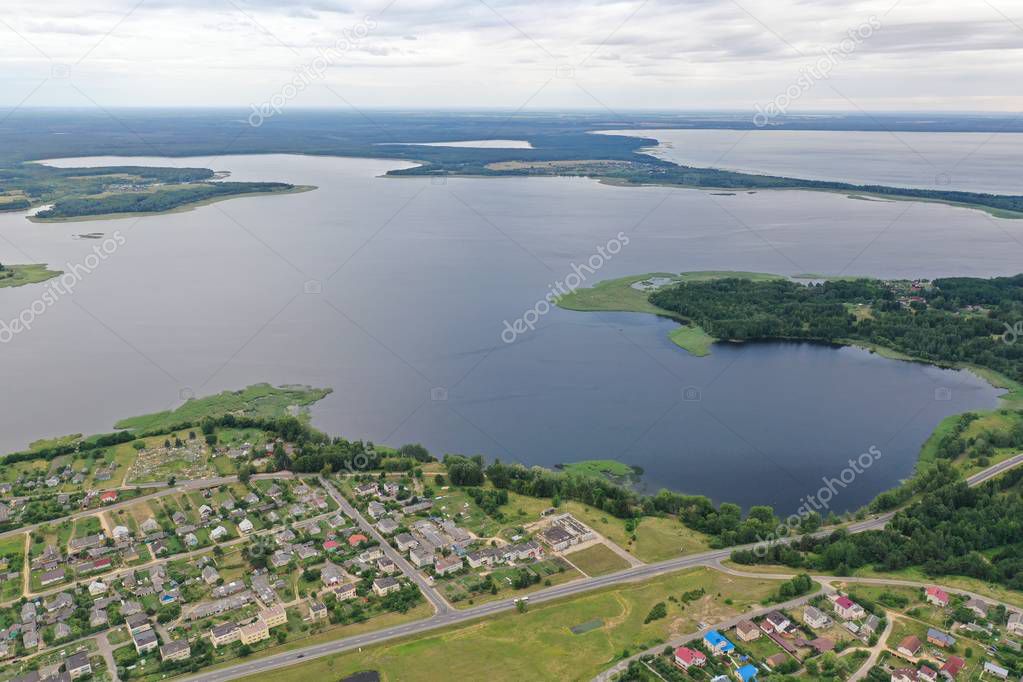 Photo of a lake on top helicopter blue water