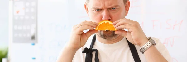 Blogger Chef Showing Unhappy Orange Slice Smile — Stock Photo, Image