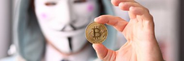 Hacker Wear anonus maske el Bitcoin tutun