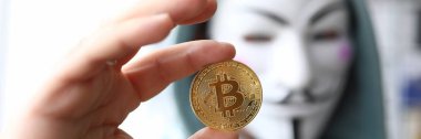 Hacker Wear anonus maske el Bitcoin tutun