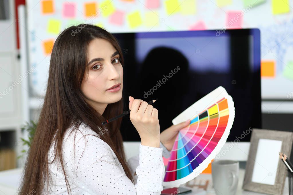 Cute lady holding colorful palette