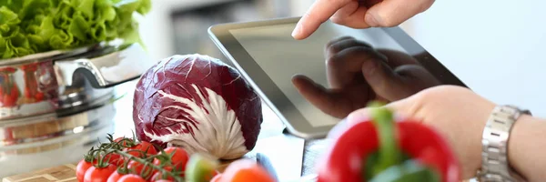 Tablet Showing Vegan Vegetables Salad Recipe