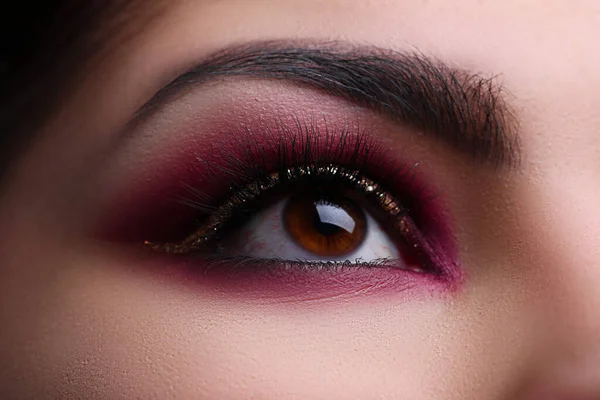 Close up, beautifully painted eye oriental style — Stock Photo, Image