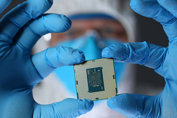 Serious man showing metal detail