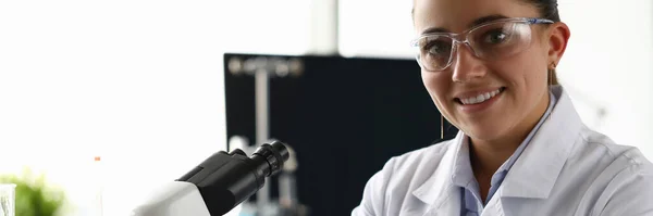 Cheerful chemist in uniform — Stock Photo, Image