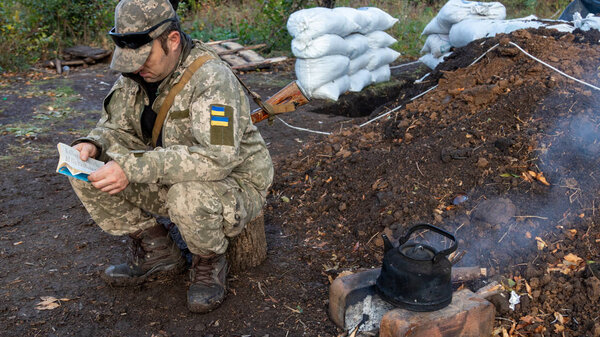 Donbass, Donetsk region/Ukraine - September 20 2019: Soldiers of Ukrainian army at the fronline on Donbass, Eastern Ukraine. 