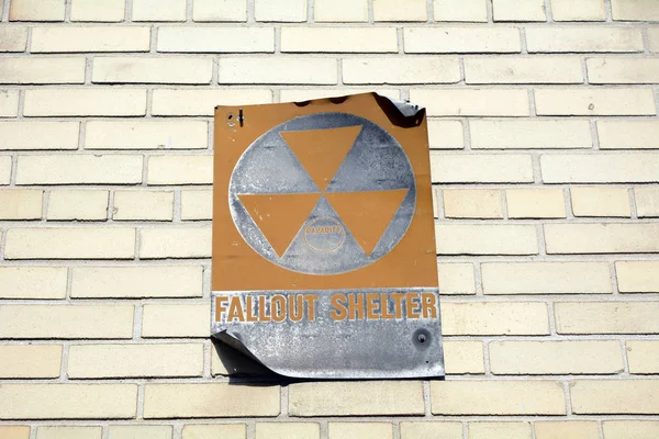 Fallout Shelter Sign on Building Wall