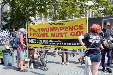 Anti Trump - Pence Sign at Protest of Supreme Court Nominee Kavanaugh In Foley Square, New York, NY, USA on August 26, 2018 clipart