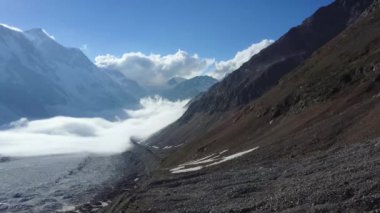Beautiful mountains of the Caucasus. Fog in the mountains. Glacier /   .   . 