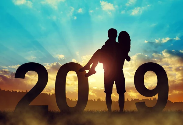 Silhouette Man Holding Woman His Arms While Celebrating New Year — Stock Photo, Image
