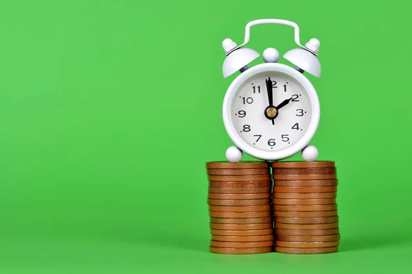 Pile Coins White Alarm Clock Green Background Time Money Concept — Stock Photo, Image