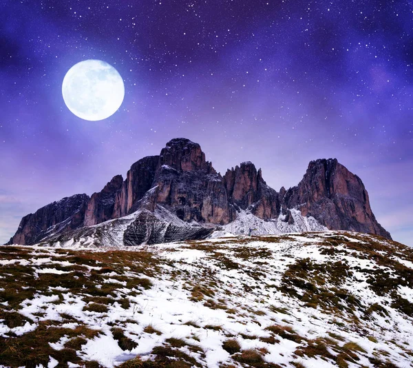 Mountain group Sassolungo (Langkofel) in the night. Beautiful landscape in Dolomites. Province of Trento, South Tyrol, Italy.