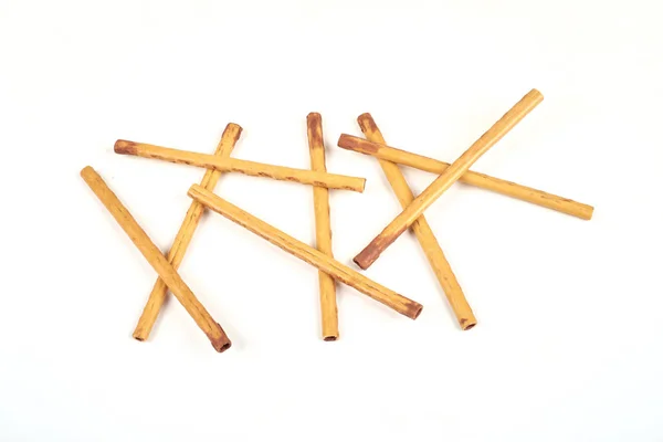 Biscuit sticks with sweet filling on white background. — Stock Photo, Image