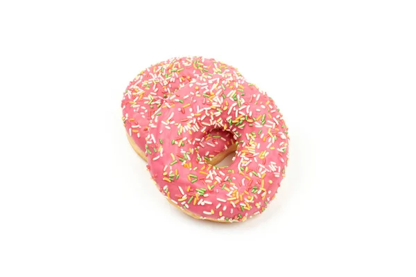 Roze donut met kleurrijke hagelslag geïsoleerd op witte achtergrond. — Stockfoto