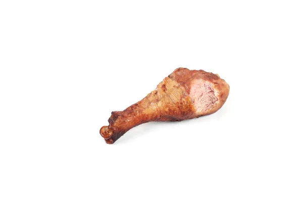 Pierna de pollo asado con mordedura tomada, aislado sobre fondo blanco . — Foto de Stock
