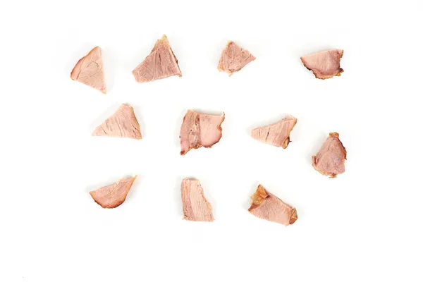 Кусочки жареного мяса индейки, изолированные на белом фоне . — стоковое фото