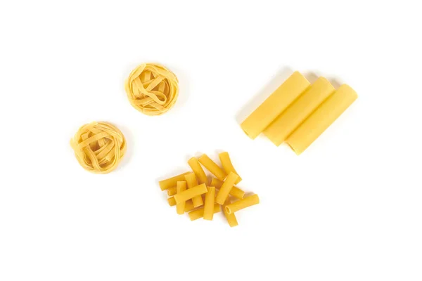 Different pasta varieties isolated on white background. — Stock Photo, Image