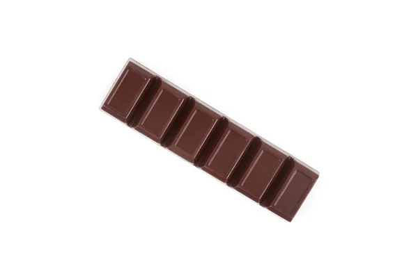 Barra de chocolate negro aislada sobre un fondo blanco. — Foto de Stock